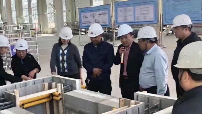 中甘國際國內工程公司一行參觀甘肅建投裝備公司“免拆復合保溫模板項目”